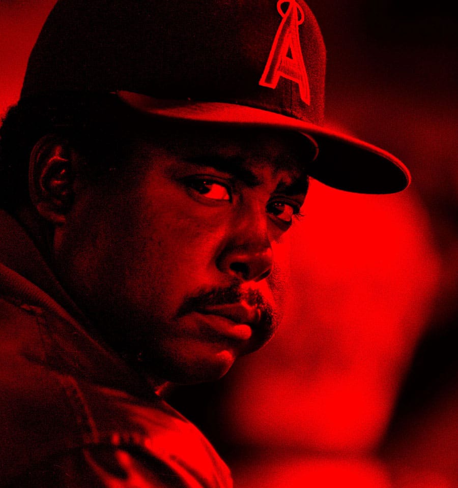 Red-tinted portrait of Donnie Moore looking toward the camera