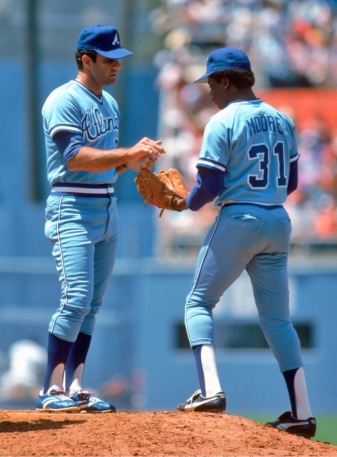 Moore made his big league debut in 1975, but only came into his own in 1984 with the Braves, when Torre (left) made him a closer. The following season Moore would make the All-Star team.