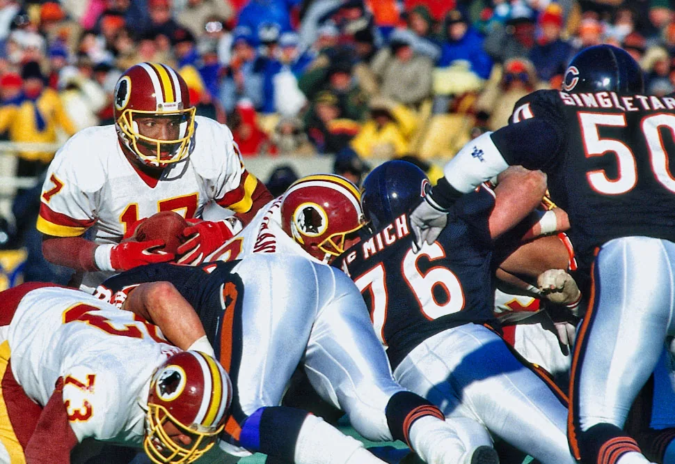 DOUG WILLIAMS He was the first black quarterback to be taken in the first round of the NFL draft, in 1979 by the Bucs, but he would earn lasting fame in Washington.