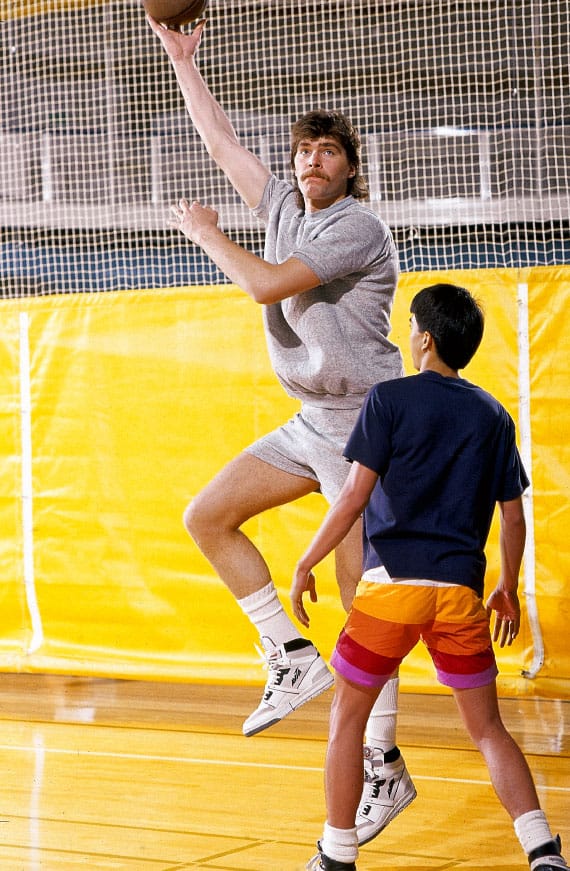 Uncommonly agile for such a big player, Arvydas (here practicing in Portland in 1988) was known for his creative passes in the post and for his effective skyhook.